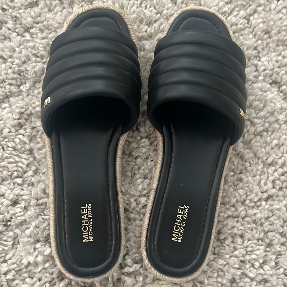 Michael Kors slide sandal.